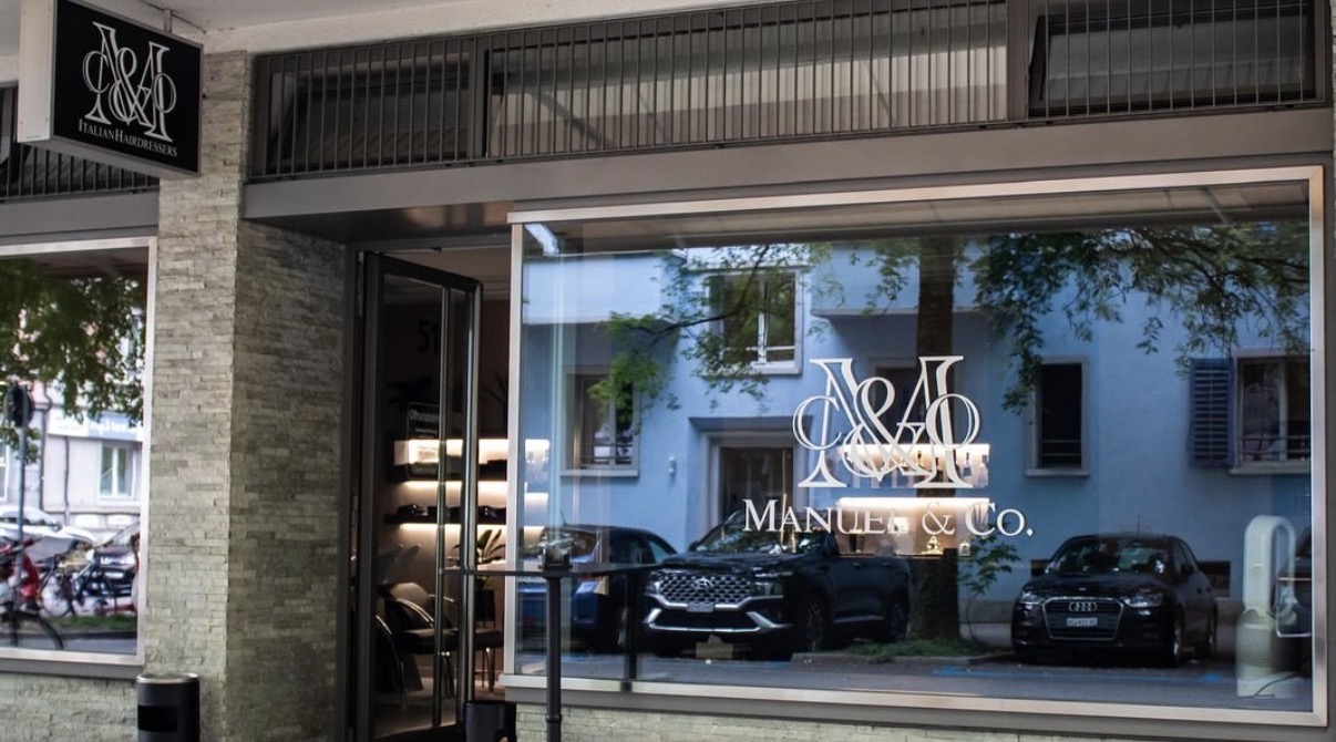 Manuel & Co. storefront by day